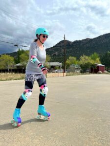 Becca roller skating in Buena Vista, Colorado. Photo by Humanitou.com