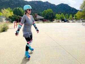 Becca roller skating in Buena Vista, Colorado. Photo by Humanitou.com