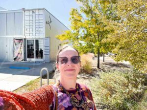 White woman in her 40s in front of Container by Turner Carroll in Santa Fe