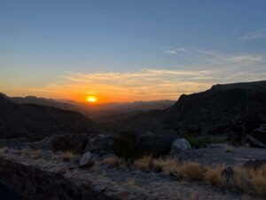 Sunrise popping up over the mountains along FM 170 in far west Texas